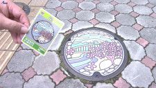 北上川や石割桜など盛岡の観光名所を描いたマンホールのふたのカード、盛岡市内のデパートで無料配布　多くのコレクターが列　