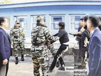 「拷問室へ向かう男」の衝撃写真…北朝鮮国民「ありえない」と驚愕