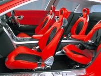 「RX-8…じゃない！」 マツダが斬新ドアの「ロータリー・スポーツカー」公開！ リトラを彷彿させる「隠れヘッドライト」採用で超カッコいい“RX-EVOLV”に反響あり
