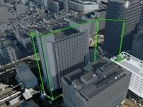 建設資材の自動運搬システム実用化へ、竹中工務店がドローンと搬送車両で開発