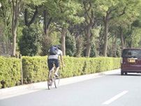 自転車を追い越すには黄色の実線を踏んじゃう！　違反を避けるために延々遅い自転車の後ろを走る……必要はなかった!!